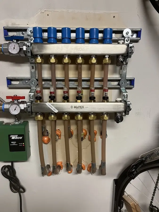 Plumber performing Gas Line Installation at a residential property in Hamilton